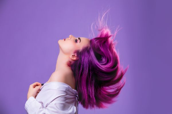 Woman with purple dyed hair — Google Maps SEO for hair salons