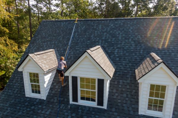 Modern residential houses with new roofing installations