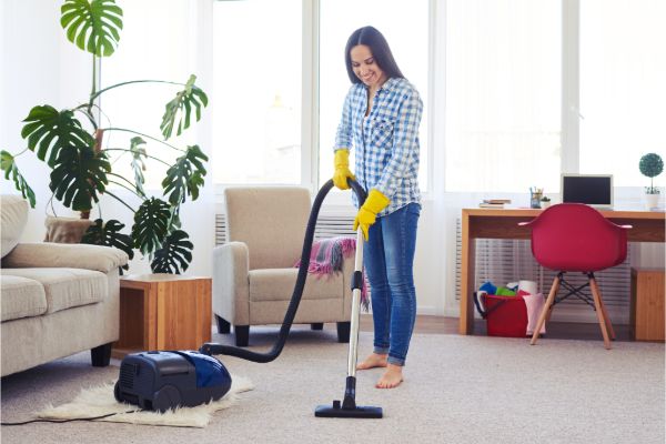 House cleaner working on carpet