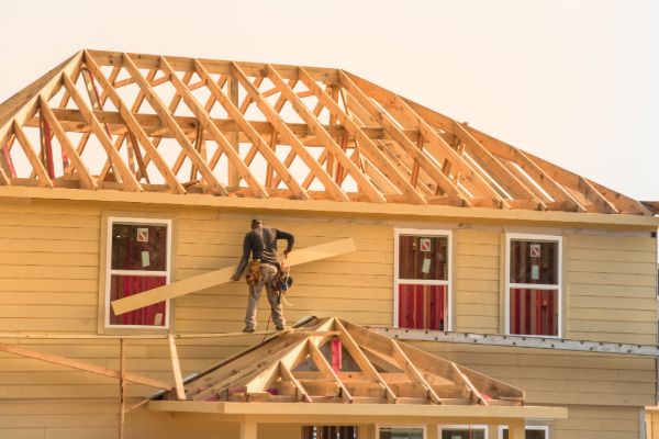 House framing construction work during home remodeling project