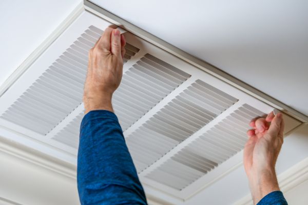 HVAC maintenance with air filter cleaning for better performance