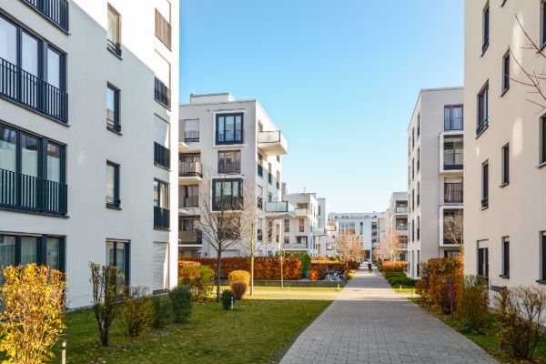 modern apartment buildings with landscaped walkway
