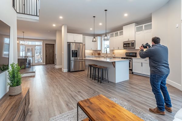 Real estate photographer capturing modern home interior