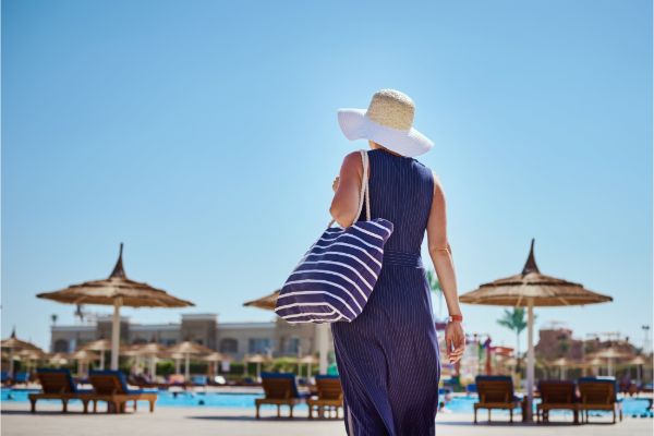 Resort guest walking on beach