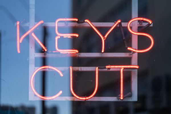Illuminated sign displaying keys cut