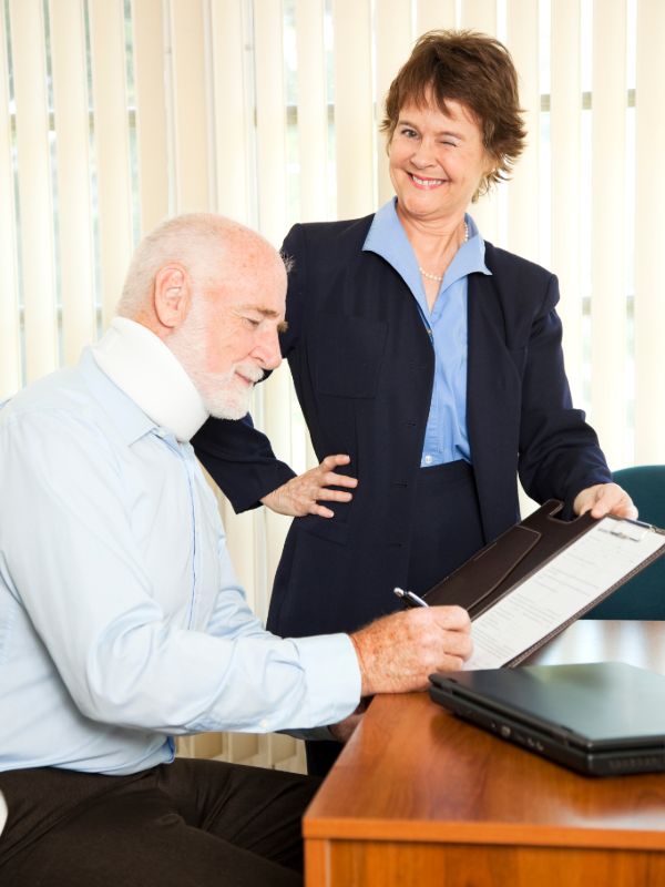 Personal injury attorney meeting with a client during a legal case consultation
