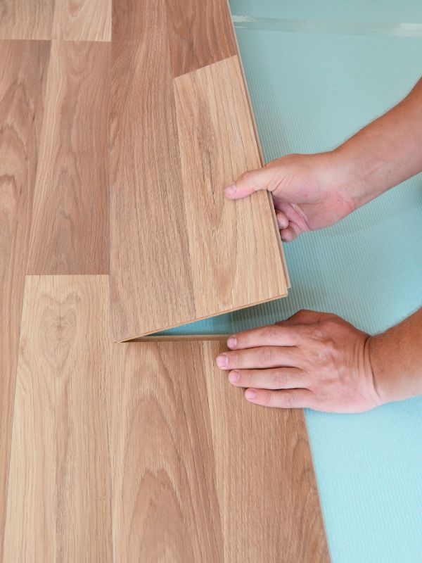 Vinyl plank flooring installation in progress