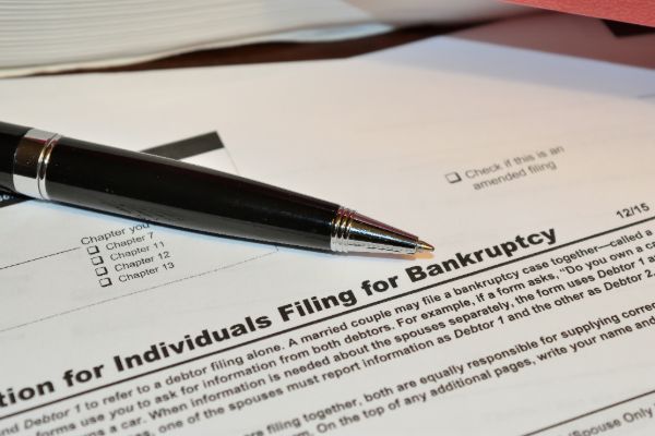 Bankruptcy filing documents and legal paperwork prepared for submission