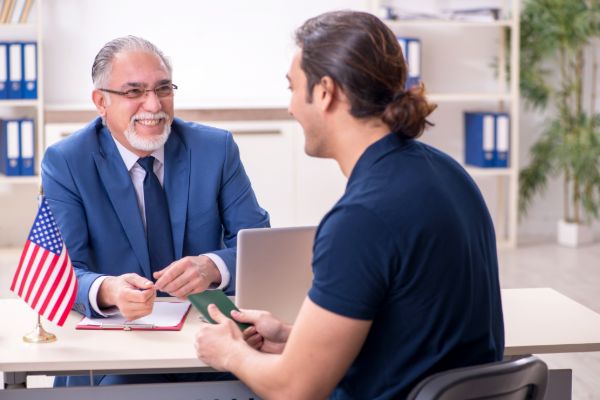 Immigration attorney meeting with a client to discuss immigration options