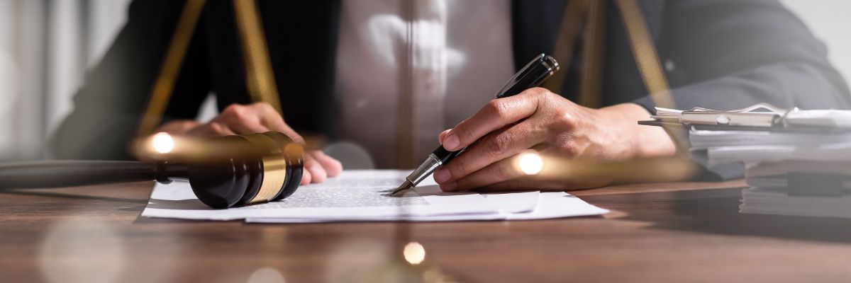 Immigration attorney reviewing legal documents and case paperwork