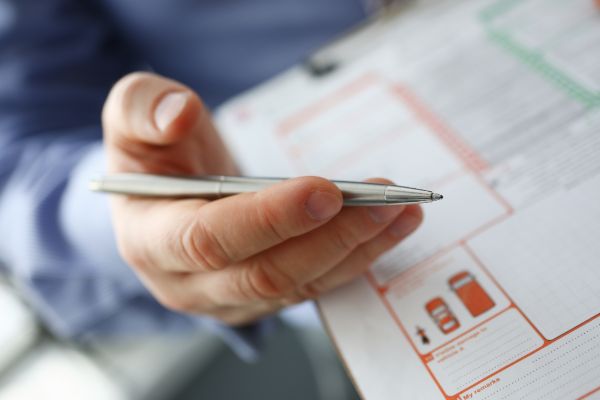 Reviewing insurance claim documents after an accident