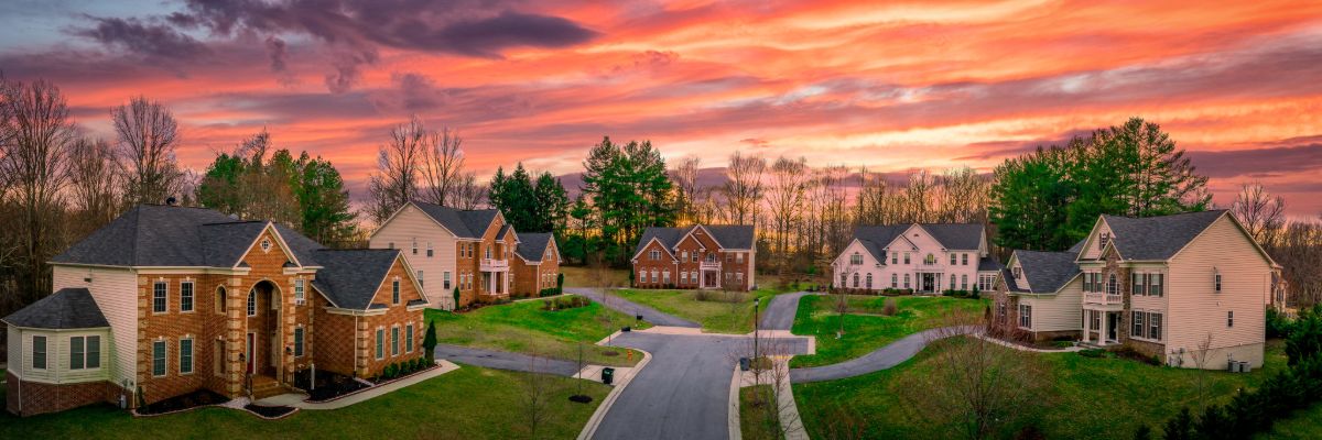 Residential neighborhood with modern homes at sunset