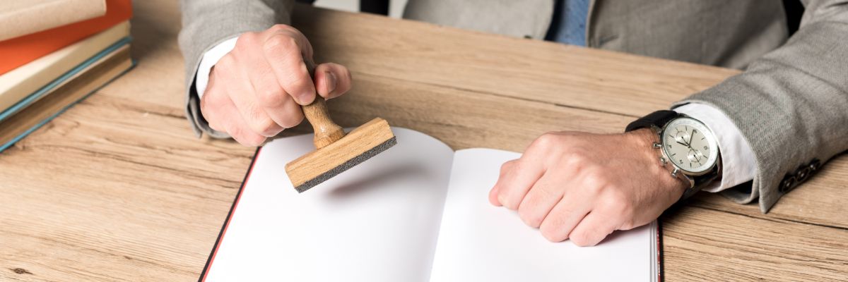 Patent attorney signing legal documents